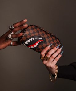 Alternative view of SAWTOOTH SHARKS IN PARIS POUCH